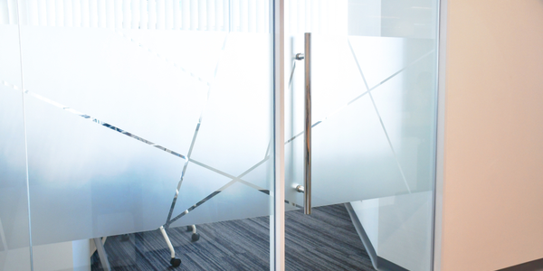 Pairing Window Film with Glass Partitions and Finishes
